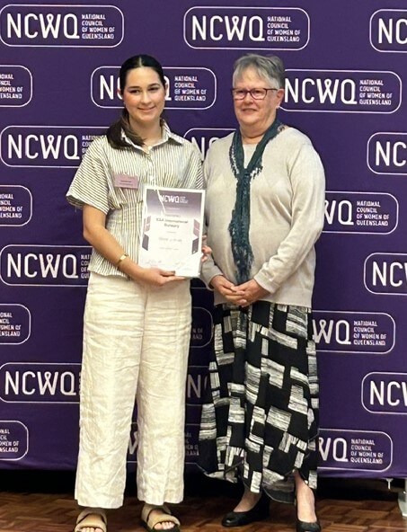 Georgia presented with her bursary by ESA secretary Lyn